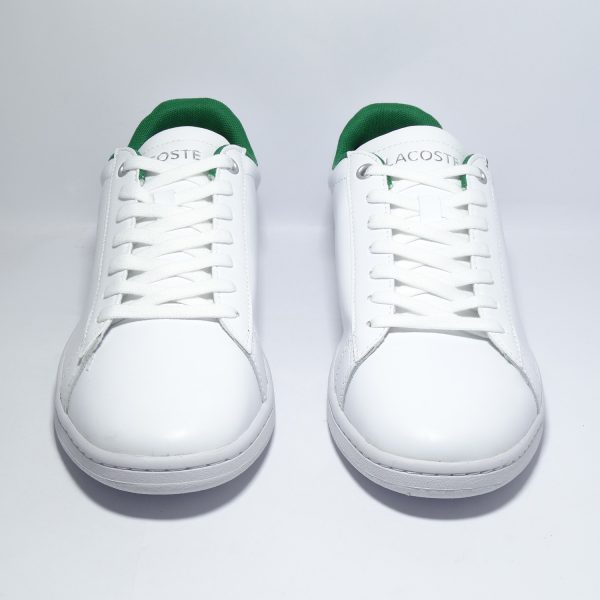 ZAPATILLAS DE ESTILO CASUAL DE BLANCO PREDOMINANTE Y DETALLES EN VERDE