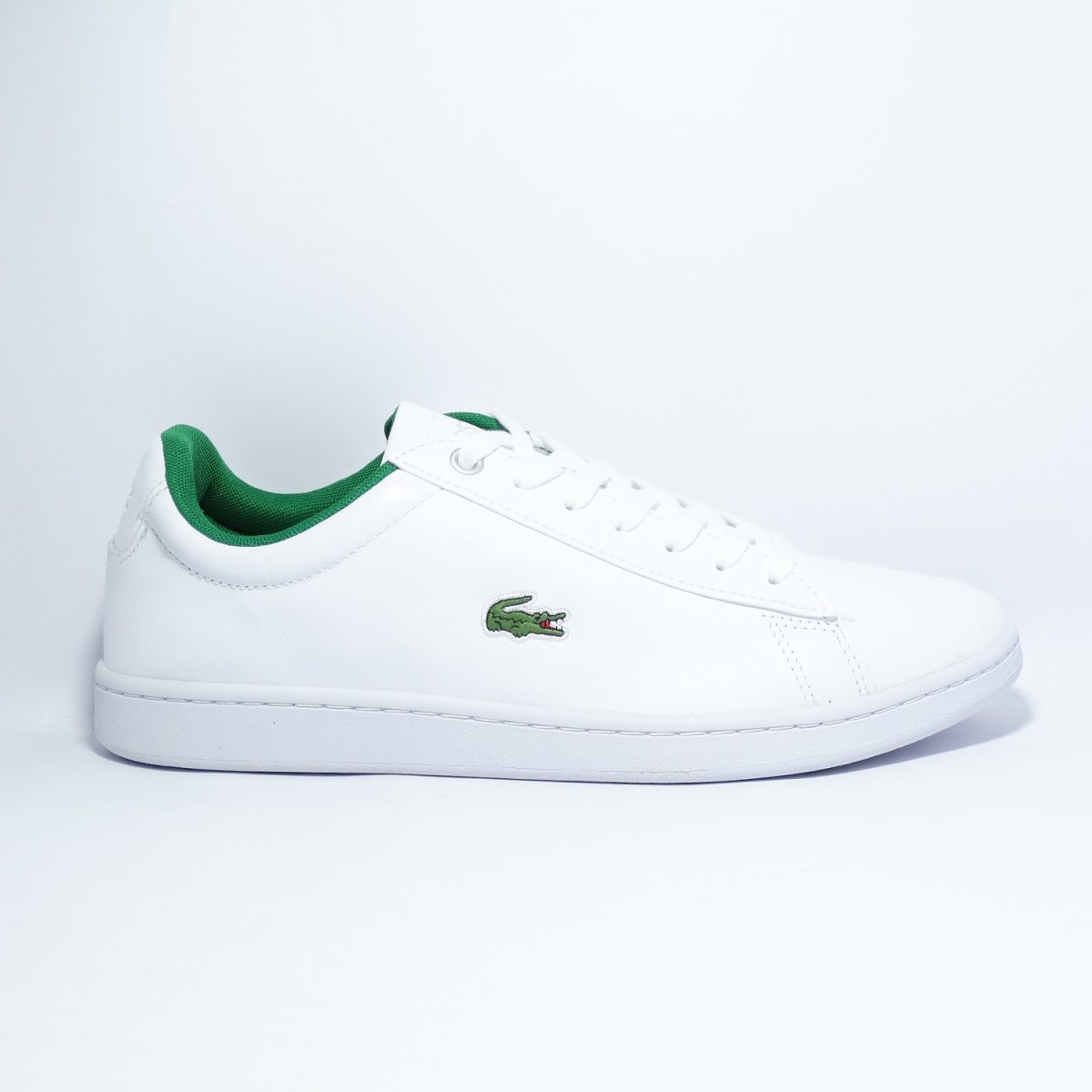 ZAPATILLAS DE ESTILO CASUAL DE BLANCO PREDOMINANTE Y DETALLES EN VERDE - Imagen 3