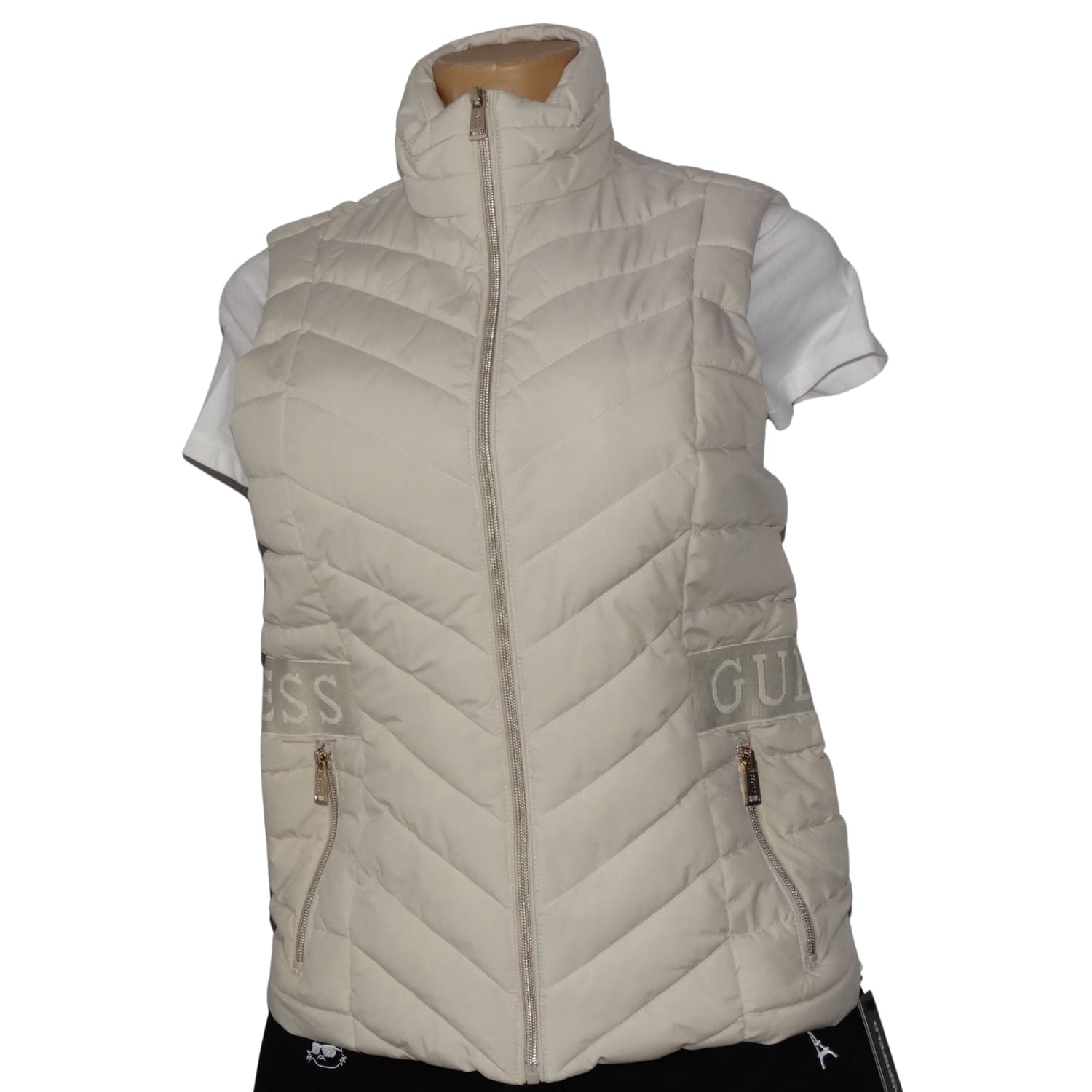 1 Parka Sin Mangas Beige Logotipo en Caderas - Imagen 1
